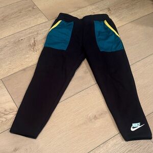 Nike Kids Black Joggers with Teal and Yellow Details